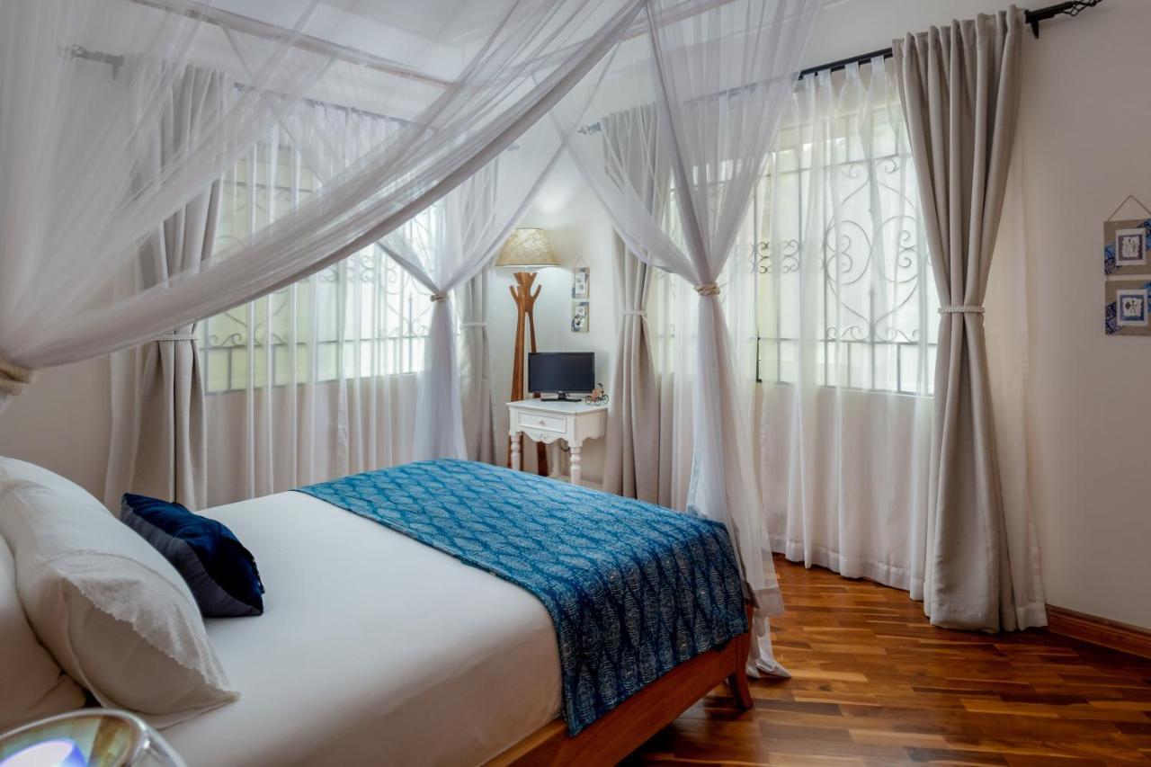 Ewange - A Casa Mia Panzió Kampala Kültér fotó